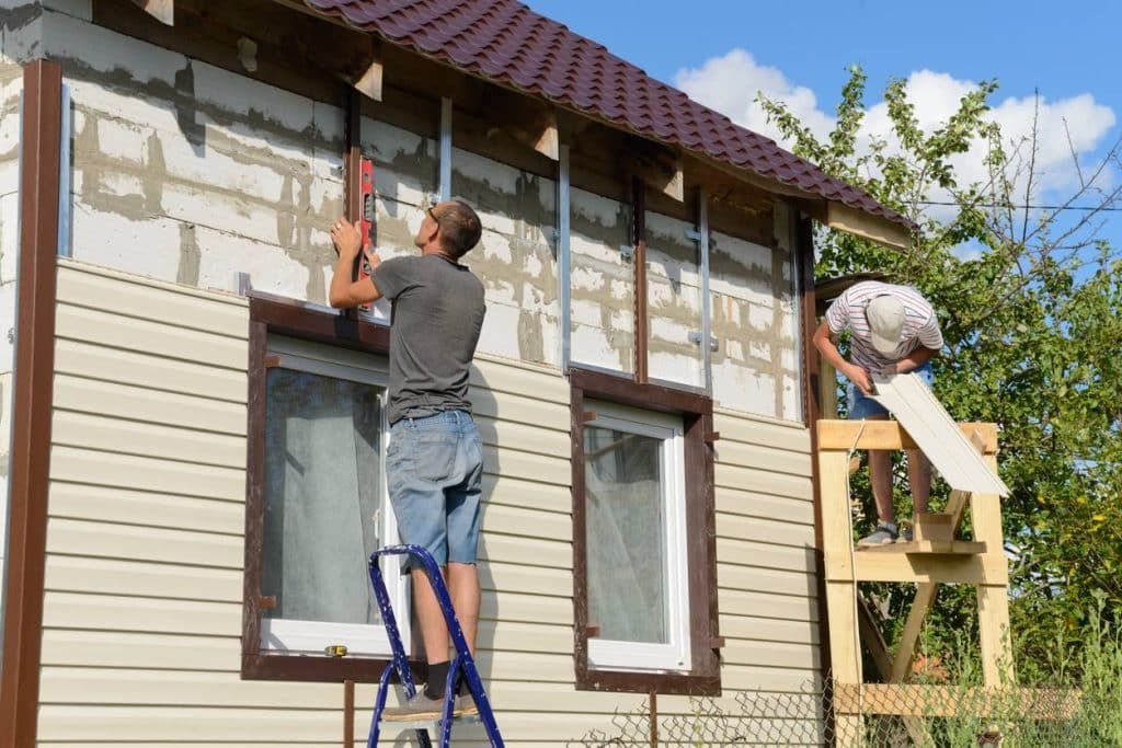 bardage maison construction revêtement